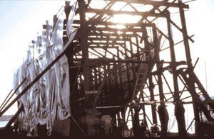 Volunteers' timber scaffolding around the hull armature during the 1974 construction.